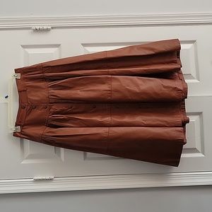 Womens Vintage leather skirt. Mid length, rust brown color